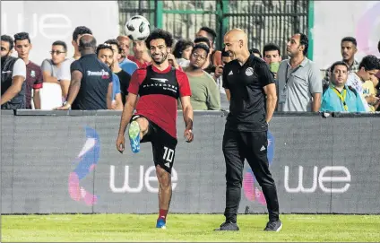  ?? Picture: AFP ?? ALL ON HIS SHOULDERS: Mohamed Salah turned up at the Egyptian training camp in Cairo on Saturday ahead of the Pharaohs’ departure for Russia. The Liverpool striker, recovering from a shoulder injury, was unable to take part but remains Egypt’s big hope...