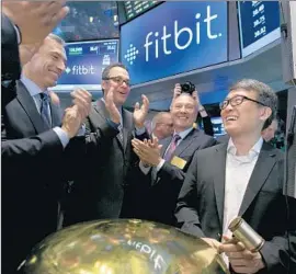  ?? Richard Drew
Associated Press ?? FITBIT I NC. in San Francisco started trading Thursday, and the stock soared more than 50% to $ 32.50 by Friday’s close, valuing the company at $ 6.5 billion.