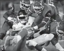  ?? ERIC PAUL ZAMORA/TRIBUNE NEWS SERVICE ?? The Fresno State defense swarms over Sacramento State running back Elijah Dotson (33) on Sept. 21, 2019, at Bulldog Stadium in Fresno.