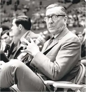  ?? AP FILE ?? UCLA coach John Wooden won 10 national titles in 12 years, seven in a row.