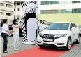  ??  ?? NATIONS TRUST BANK DIRECTOR/CEO RENUKA FERNANDO (RIGHT) FLAGGING OFF THE NATIONS CORPORATE RALLY IN THE PRESENCE OF NATIONS TRUST BANK DGM COMMERCIAL BANKING RAMANIKA UNAMBOOWE