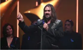  ??  ?? Warwick Thornton accepts the Aacta award for best film for Sweet Country. He called called Australia’s detention of asylum seekers and refugees on Nauru and Manus Island ‘disgusting and childish and ridiculous’. Photograph: Mark Metcalfe/Getty Images for AFI