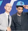  ?? COREY SIPKIN/AP ?? James Bouknight, right, stands with NBA Commission­er Adam Silver after being selected 11th overall by the Charlotte Hornets on July 29.