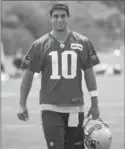  ?? ASSOCIATED PRESS FILE PHOTO ?? The New England Patriots will be counting on Jimmy Garoppolo to lead them, for four games anyway.