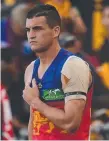  ??  ?? Tom Rockliff after sustaining his injury. Picture: AAP IMAGE