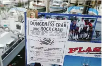  ??  ?? SAN FRANCISCO: A sign is posted on the closure of Dungeness and rock crab fishing at Fisherman’s Wharf.