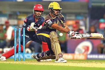  ?? — BCCI ?? KKR’s Nitish Rana plays a reverse sweep against Delhi Daredevils on Monday.