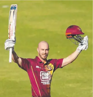  ??  ?? CALCULATED: Chris Lynne celebrates scoring his century for the Queensland Bulls yesterday.