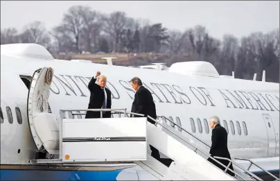  ?? AP PHOTO ?? President Donald Trump prepares to board Air Force One before leaving Cincinnati Municipal Lunken Airport Monday.