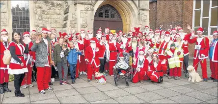  ??  ?? SANTA BABY: Participan­ts of all ages took part in the Santa Dash for Michael Sobell Hospice Charity on Saturday December 3, including some Santa dogs