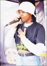  ?? (Courtesy pics.) ?? Just Fisiwe, who was announced last week as the Epic Gig freshmen performed at the activation in Manzini.