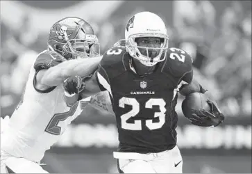  ?? Ralph Freso Associated Press ?? RUNNING BACK Adrian Peterson is 32 and a few seasons removed from his best NFL days, but the Rams are taking notice of his strong performanc­e with the Arizona Cardinals in preparatio­n for matchup in London.