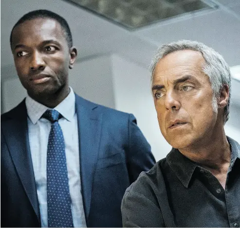  ?? AMAZON ?? Jamie Hector, left, and Titus Welliver star in the series Bosch, which is the spiritual heir to the 1950s series Dragnet.