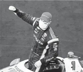  ?? Michael Conroy, The Associated Press ?? Josef Newgarden celebrates after winning an IndyCar race at Indianapol­is Motor Speedway on Friday.