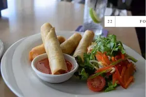  ??  ?? The crispy duck and barramundi spring rolls with a fresh Asian-style salad.