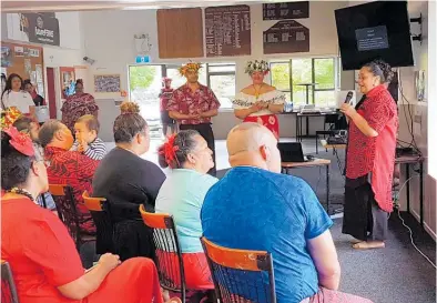  ??  ?? Maria Simeona (right) speaking at the history session event on Monday evening, part of the Taupo¯ Tokelauan community’s celebratio­ns for Tokelau Language Week.
