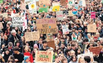  ?? STEFAN WERMUTH / AFP ?? Prefácio. Nas ruas de Lausanne, protesto pelo meio ambiente, um dos temas de Davos