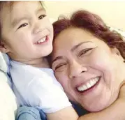  ??  ?? Gina with grandkid Zephyr Eigenmann, son of AJ