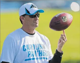  ?? Chuck Burton
Associated Press ?? CAROLINA offensive coordinato­r Mike Shula is the son of Hall of Fame coach Don Shula, who won two Super Bowls with the Miami Dolphins. Mike Shula has never been a head coach in the NFL.