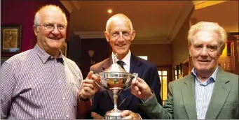  ??  ?? Billy Redmond, Fleetwood Cup winner in New Ross, with Martin Carroll (Captain) and Basil Glennon (sponsor).