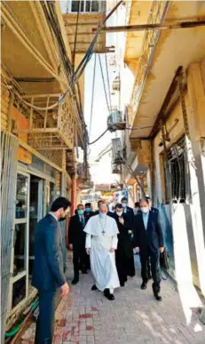  ?? AFP ?? ■Pope Francis arrives at the Iraqi shrine city of Najaf yesterday for the historic meeting with Grand Ayatollah Ali Al Sistani. Their meeting lasted a total of 40 minutes.