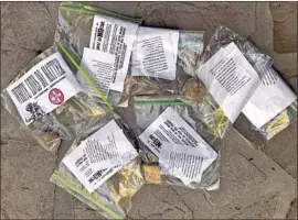  ??  ?? RACIST FLIERS were found in Surf City on April 4, a week after similar items littered Newport Beach. Said one activist: “We are in the midst of a storm of hate.”