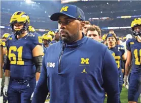  ?? MARK J. REBILAS/USA TODAY SPORTS ?? Michigan offensive coordinato­r Sherrone Moore is seen during the College Football Playoff title game against Washington on Jan. 8. Moore replaced Jim Harbaugh as head coach of the Wolverines.