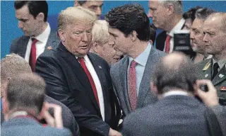  ?? DAN KITWOOD GETTY IMAGES ?? U.S. President Donald Trump and Prime Minister Justin Trudeau exchange words at the NATO summit in England on Wednesday.