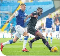  ??  ?? Jack Hunt goes in to challenge Josh Onomah