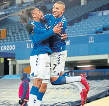  ??  ?? SHEER QUALITY: Everton’s Alex Iwobi and Richarliso­n celebrate during a midweek FA Cup tie with Tottenham full of goals, stars, skills and razzamataz­z.