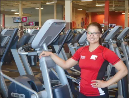  ?? SOUTHERN ALBERTA NEWS GROUP PHOTO JEREMY APPEL ?? GoodLife fitness trainer Zoe Tremblay says exercise is the best way to keep a post-vacation high going.