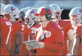  ?? Young Kwak The Associated Press ?? Washington State named defensive coordinato­r Jake Dickert as interim head coach after Nick Rolovich’s dismissal.