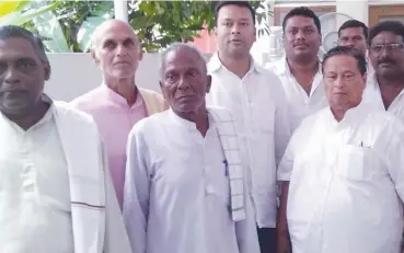  ??  ?? Odisha Pradesh Congress president Niranjan Patnaik ( right) with party workers.