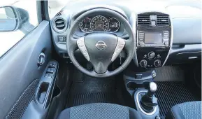  ??  ?? The interior of the 2018 Nissan Versa Note is a bit Spartan and plastic, but uncomplica­ted with everything easy to find.