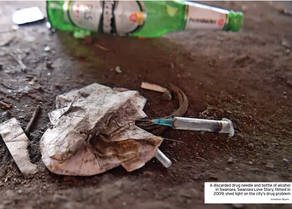  ?? Jonathan Myers ?? A discarded drug needle and bottle of alcohol in Swansea. Swansea Love Story, filmed in 2009, shed light on the city’s drug problem