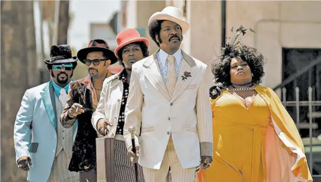  ?? NETFLIX ?? Eddie Murphy and, from left, Craig Robinson, Mike Epps, Tituss Burgess and Da’Vine Joy Randolph in a scene from “Dolemite is My Name.”