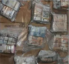  ??  ?? Some of the cash seized by Gardai.