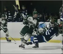  ?? JOE BOYLE — MEDIANEWS GROUP ?? Shen and Capital District Jets players collide on February 22in Clifton Park in a Section II play-in game.