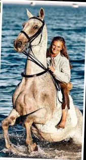  ?? ?? HOUSE HORSE: Sparky, top, at home with Callie and son. Above left: Checking on baby Peregrine. Above: Beach fun for Callie