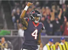  ?? ERIC CHRISTIAN SMITH/ASSOCIATED PRESS ?? Texans quarterbac­k Deshaun Watson threw for 210 yards and two touchdowns and ran for a third.