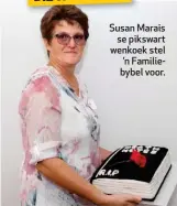  ??  ?? Susan Marais se pikswart wenkoek stel ’n Familiebyb­el voor.