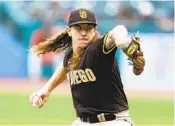  ?? RON SCHWANE AP ?? Padres starter Mike Clevinger throws against the Guardians during the first inning Wednesday.