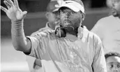  ?? CHRIS HAYS/STAFF ?? Players have flocked to Orlando’s Jones High School to play for popular football coach Elijah Williams.