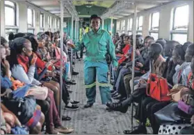  ??  ?? Road woes: The shortage of buses and taxis on the roads has forced commuters to use trains. Photo: Thomas Mukoya/Reuters