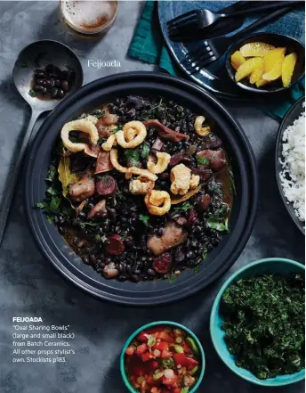  ??  ?? FEIJOADA “Oval Sharing Bowls” (large and small black) from Batch Ceramics. All other props stylist’s own. Stockists p183. Feijoada