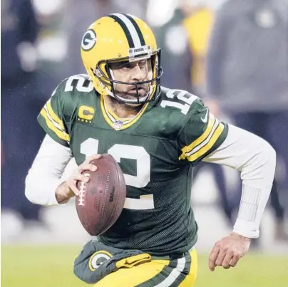  ?? JEFFREY PHELPS/AP ?? One of the biggest uncertaint­ies in the NFL: Will reigning MVP Aaron Rodgers still be wearing a Packers uniform this season.