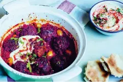  ??  ?? This one-pot baked harrisa falafel uses tinned tomatoes, ready-to-eat falafel, onions and olives (Luke Albert)