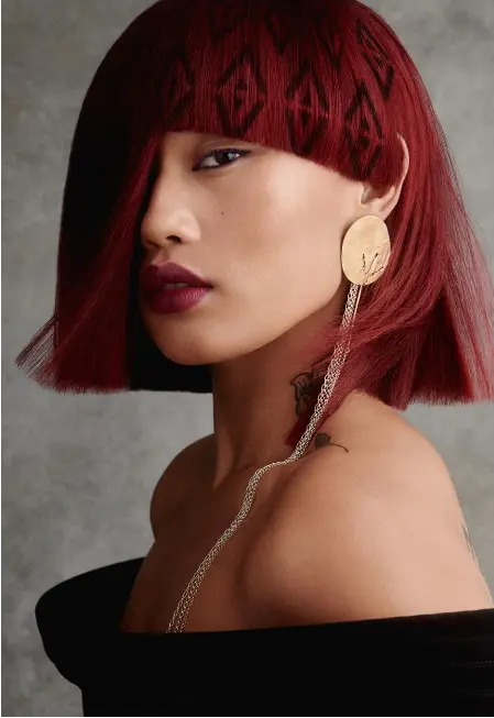  ?? ?? BRADLEY SHARPE dress, DEA RAIL JEWELS earring