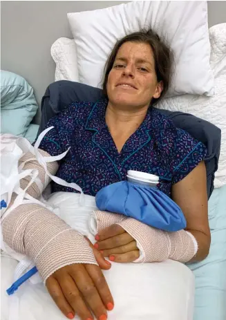  ??  ?? OPPOSITE Skye Moench wins Ironman 70.3 Texas 2021
BELOW 2019, post accident, in the hospital