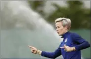  ?? LAURENT CIPRIANI — THE ASSOCIATED PRESS ?? United States’ Megan Rapinoe gestures during a training session of the US Women’s Soccer team at a training ground in Lyon, France Monday. The US will face England in a Women’s World Cup semifinal match Tuesday in Lyon.